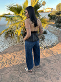 Pantalón Bloom de Noor De Luna en color neutro, con diseño cómodo y estilo moderno, mostrando la prenda vista de frente.